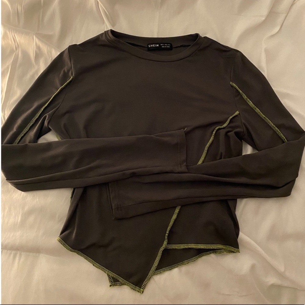 Stitch trim asymmetrical top